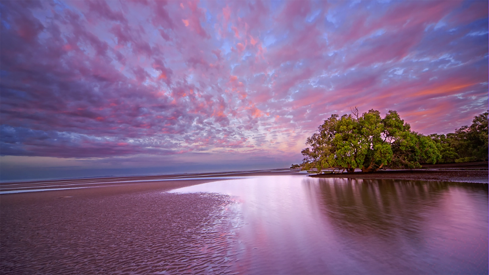 Golden Australian sunset casting warm light across the bush, capturing the magic delivered monthly in True Blue Pen Pals adventure subscription for kids
